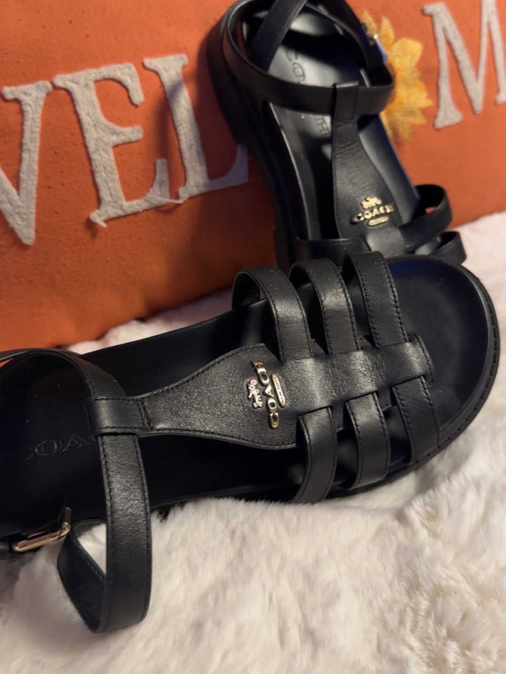 COACH Black Leather T-Strap Woven Sandals with Gold Logo